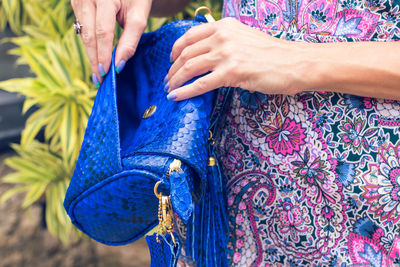 Close-up of woman holding hands