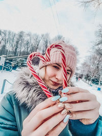 Portrait of woman in snow