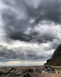 Scenic view of storm clouds over dramatic sky