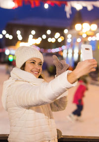 Young woman using mobile phone