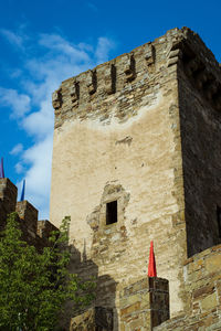 Low angle view of old building against sky