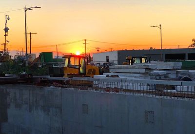 Building against sky during sunset
