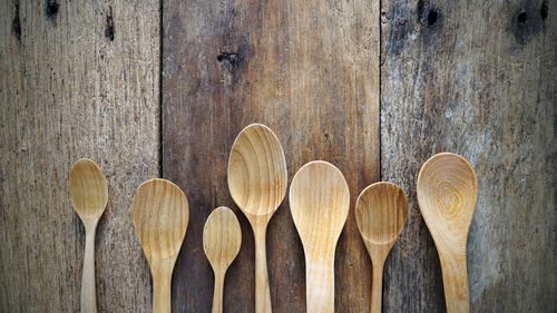 Directly above shot of wooden spoons on table