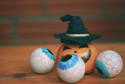 Close-up of multi colored eggs on table