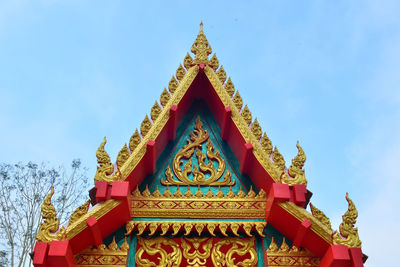 Low angle view of temple against building