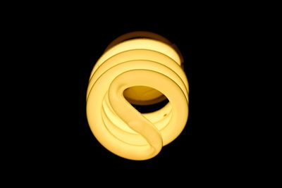 Close-up of illuminated light bulb