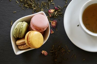 High angle view of coffee and dessert on table