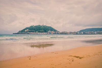 Scenic view of beach against sky