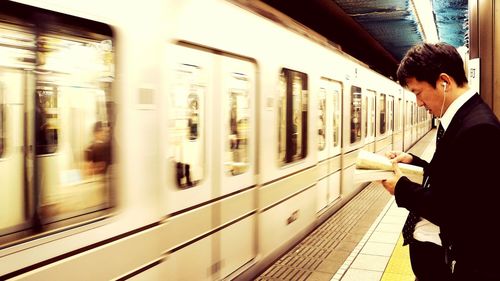 Blurred motion of train at subway station