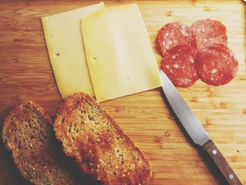 High angle view of bread on cutting board