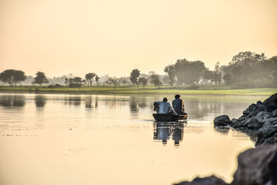 Scenic view of lake during sunset