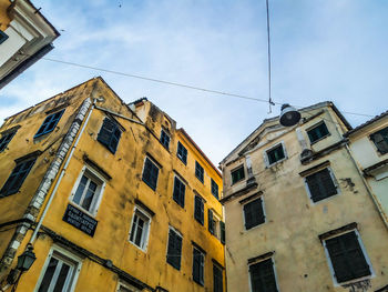 Low angle view of residential building against sky