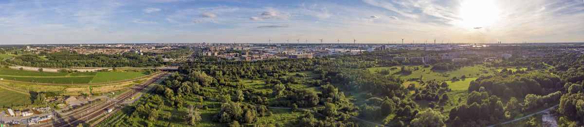 View on antwerp north area, with city and harbor in far distance, nature park oude landen 