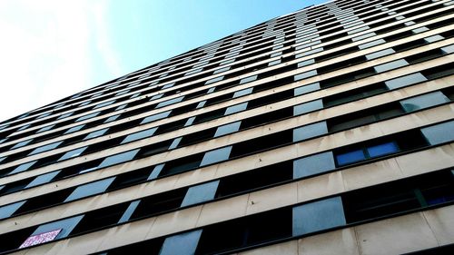 Low angle view of modern building against sky