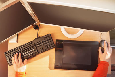 Man using laptop on table