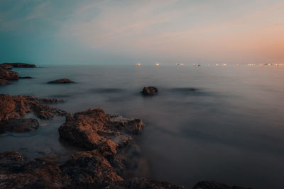 Scenic view of sea against sky during sunset