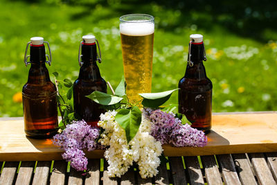 Close-up of wine bottles on table