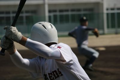 Rear view of a baseball hitter