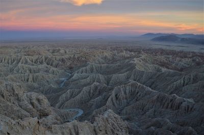 Aerial view of landscape against sky during sunset