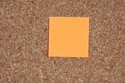 Directly above shot of yellow paper on wall