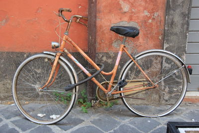 Bicycle parked on road