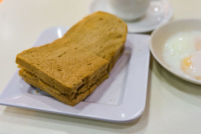 Close-up of breakfast served on table