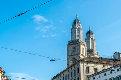 Low angle view of building against blue sky