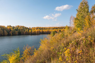 Scenic view of lake against sky during autumn