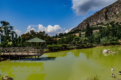 Pier over lake against mountain