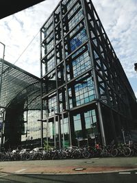 Low angle view of office building against sky