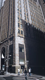 Man in front of building