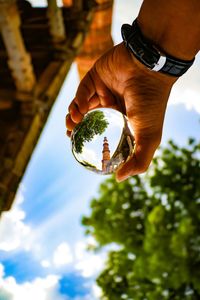 Midsection of person holding ice cream