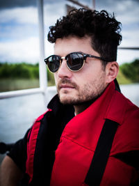 Portrait of young man wearing sunglasses