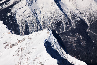 Scenic view of snowcapped mountains during winter