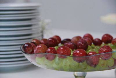 Close-up of fruits in plate on table