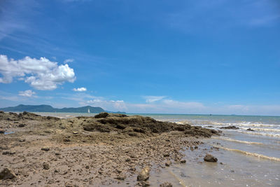 Scenic view of beach against sky