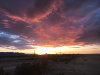 Scenic view of dramatic sky during sunset