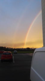 Close-up of rainbow against sky at sunset