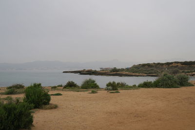 Scenic view of beach against clear sky