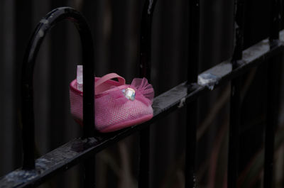 Close-up of padlocks on railing