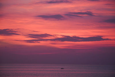 Scenic view of sea against orange sky during sunset