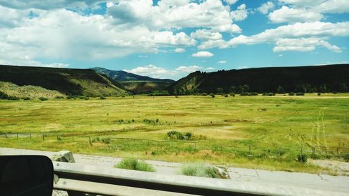 Scenic view of field against sky