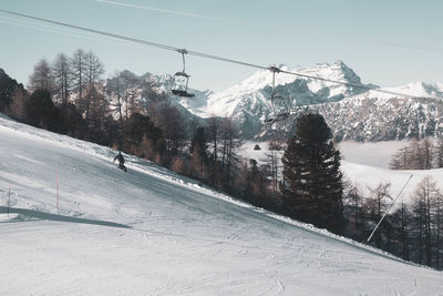 Snow covered mountain against sky