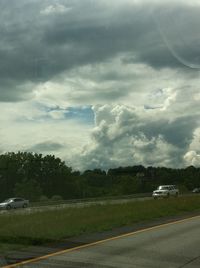 Road by street against sky