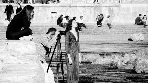 Group of people photographing at observation point