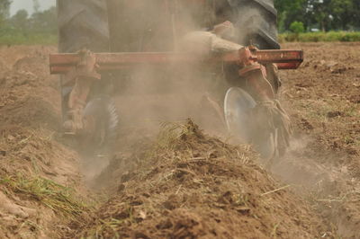 Panoramic view of agricultural vehicle on field