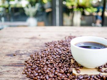 Close-up of coffee cup on table