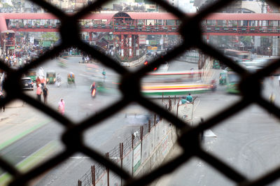 Chainlink fence against blurred background