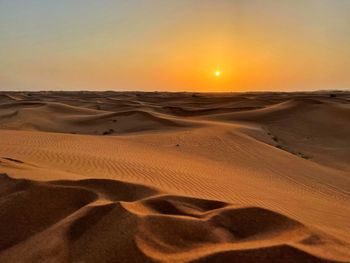 Scenic view of desert during sunset