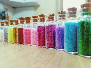 Close-up of multi colored candies on table